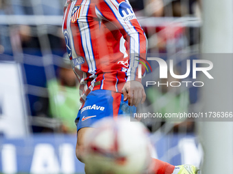 Giuliano Simeone of Atletico de Madrid shows the ball of his goal during the La Liga EA Sports 2024/25 football match between Atletico de Ma...