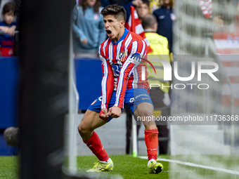 Giuliano Simeone of Atletico de Madrid celebrates his goal during the La Liga EA Sports 2024/25 football match between Atletico de Madrid an...