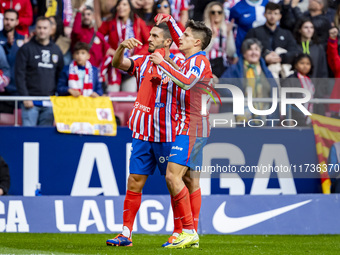 Giuliano Simeone of Atletico de Madrid (right) and Jorge Resurreccion Merodio (Koke) of Atletico de Madrid (left) celebrate a goal, dedicati...