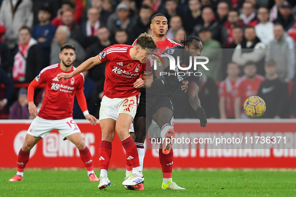 Ryan Yates of Nottingham Forest battles with Michail Antonio of West Ham United during the Premier League match between Nottingham Forest an...