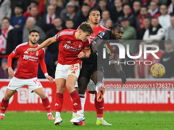 Ryan Yates of Nottingham Forest battles with Michail Antonio of West Ham United during the Premier League match between Nottingham Forest an...