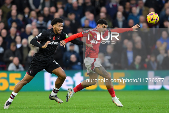 Morgan Gibbs-White of Nottingham Forest battles with Jean-Clair Todibo of West Ham United during the Premier League match between Nottingham...