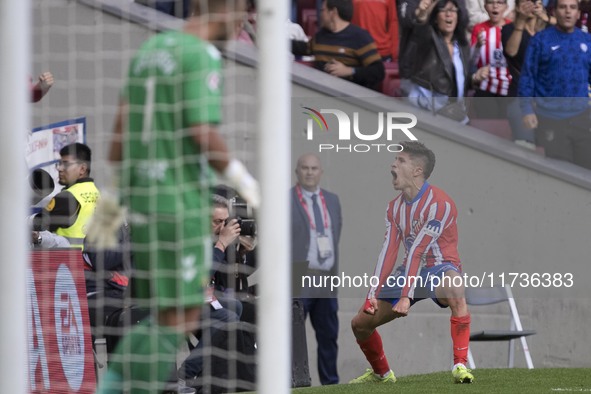 In Madrid, Spain, on November 3, Giuliano Simeone of Atletico de Madrid celebrates a goal during the La Liga 2024/25 match between Atletico...