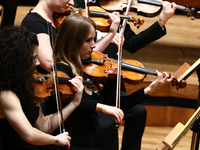 Violonists perform during Eufonie Fesrival at the ICE Congress Center in Krakow, Poland on November 2, 2024. (