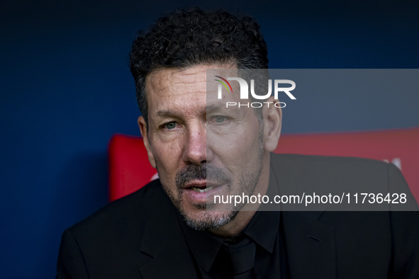 Diego Pablo Simeone, head coach of Atletico de Madrid, sits on the bench during the La Liga EA Sports 2024/25 football match between Atletic...