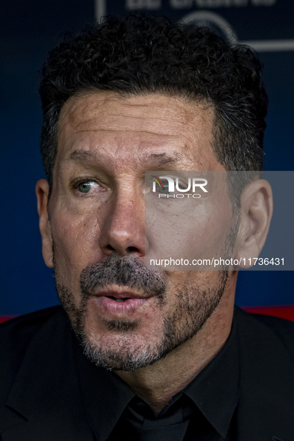 Diego Pablo Simeone, head coach of Atletico de Madrid, sits on the bench during the La Liga EA Sports 2024/25 football match between Atletic...