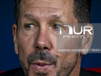 Diego Pablo Simeone, head coach of Atletico de Madrid, sits on the bench during the La Liga EA Sports 2024/25 football match between Atletic...