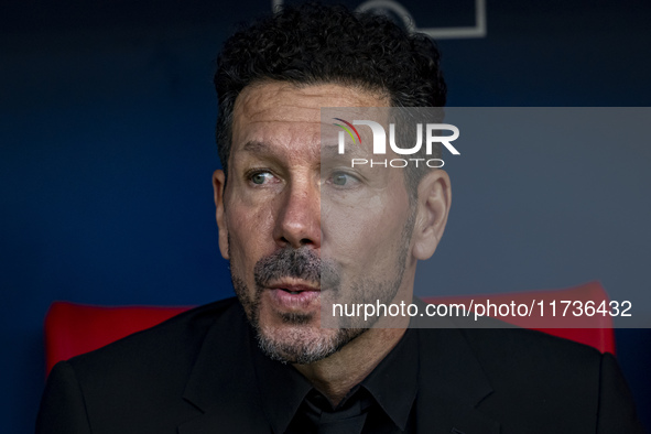 Diego Pablo Simeone, head coach of Atletico de Madrid, sits on the bench during the La Liga EA Sports 2024/25 football match between Atletic...