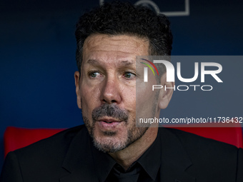 Diego Pablo Simeone, head coach of Atletico de Madrid, sits on the bench during the La Liga EA Sports 2024/25 football match between Atletic...