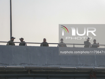 Indian police forces stand alert at the site of a grenade explosion in Srinagar, Indian-administered Kashmir, on November 3, 2024. Ten peopl...