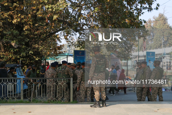 Indian paramilitary troops remain on alert near the site of a grenade explosion in Srinagar, Indian-administered Kashmir, on November 3, 202...