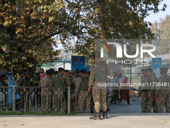 Indian paramilitary troops remain on alert near the site of a grenade explosion in Srinagar, Indian-administered Kashmir, on November 3, 202...