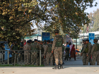 Indian paramilitary troops remain on alert near the site of a grenade explosion in Srinagar, Indian-administered Kashmir, on November 3, 202...