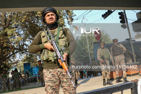 Indian paramilitary troops remain on alert near the site of a grenade explosion in Srinagar, Indian-administered Kashmir, on November 3, 202...