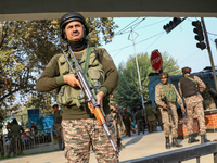 Indian paramilitary troops remain on alert near the site of a grenade explosion in Srinagar, Indian-administered Kashmir, on November 3, 202...