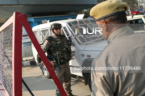 Indian paramilitary troops remain on alert near the site of a grenade explosion in Srinagar, Indian-administered Kashmir, on November 3, 202...