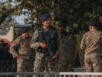 Indian paramilitary troops remain on alert near the site of a grenade explosion in Srinagar, Indian-administered Kashmir, on November 3, 202...