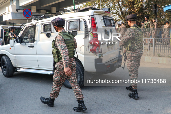 Indian paramilitary troops patrol near the site of a grenade explosion in Srinagar, Indian-administered Kashmir, on November 3, 2024. Ten pe...