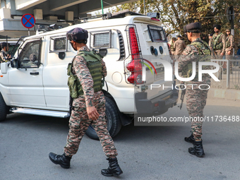 Indian paramilitary troops patrol near the site of a grenade explosion in Srinagar, Indian-administered Kashmir, on November 3, 2024. Ten pe...