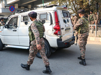 Indian paramilitary troops patrol near the site of a grenade explosion in Srinagar, Indian-administered Kashmir, on November 3, 2024. Ten pe...