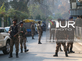 Indian paramilitary troops patrol near the site of a grenade explosion in Srinagar, Indian-administered Kashmir, on November 3, 2024. Ten pe...