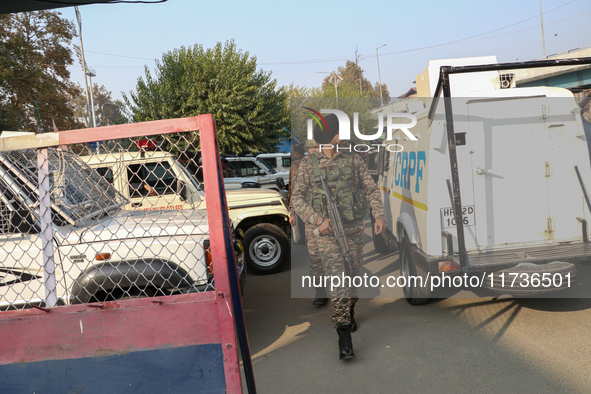 Indian paramilitary troops patrol near the site of a grenade explosion in Srinagar, Indian-administered Kashmir, on November 3, 2024. Ten pe...