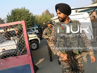 Indian paramilitary troops patrol near the site of a grenade explosion in Srinagar, Indian-administered Kashmir, on November 3, 2024. Ten pe...