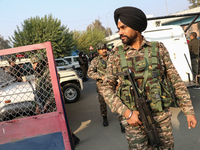 Indian paramilitary troops patrol near the site of a grenade explosion in Srinagar, Indian-administered Kashmir, on November 3, 2024. Ten pe...