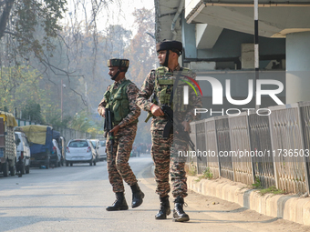 Indian paramilitary troops patrol near the site of a grenade explosion in Srinagar, Indian-administered Kashmir, on November 3, 2024. Ten pe...