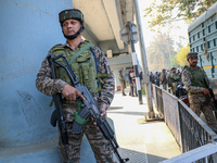 Indian paramilitary troops remain on alert near the site of a grenade explosion in Srinagar, Indian-administered Kashmir, on November 3, 202...