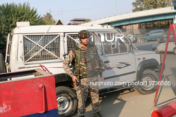 Indian paramilitary troops remain on alert near the site of a grenade explosion in Srinagar, Indian-administered Kashmir, on November 3, 202...