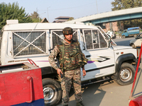 Indian paramilitary troops remain on alert near the site of a grenade explosion in Srinagar, Indian-administered Kashmir, on November 3, 202...