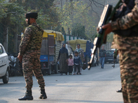 Indian paramilitary troops remain on alert near the site of a grenade explosion in Srinagar, Indian-administered Kashmir, on November 3, 202...