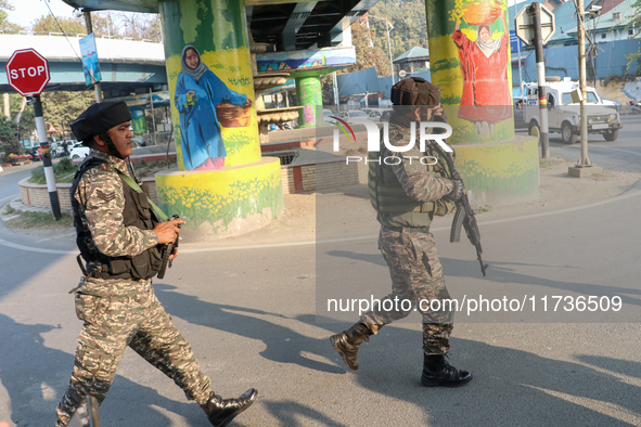 Indian paramilitary troops patrol near the site of a grenade explosion in Srinagar, Indian-administered Kashmir, on November 3, 2024. Ten pe...