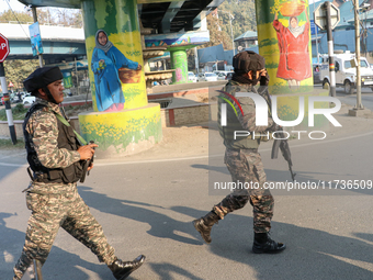 Indian paramilitary troops patrol near the site of a grenade explosion in Srinagar, Indian-administered Kashmir, on November 3, 2024. Ten pe...