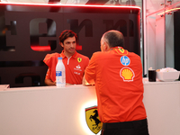 Carlos Sainz Jr. of Spain drives the (55) Scuderia Ferrari SF-24 Ferrari, and Frederic Vasseur, Team Principal of Scuderia Ferrari, during t...