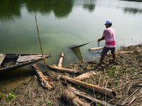 Jalangi River Is Almost Devoid Of Fish Due To Pollution. Casting A Net For Fish In A River Often Results In Garbage Arriving Instead Of Fish...