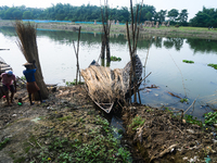 Jalangi River Is Almost Devoid Of Fish Due To Pollution. Casting A Net For Fish In A River Often Results In Garbage Arriving Instead Of Fish...