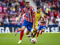 Alexander Sorloth of Atletico de Madrid is in action with the ball during the La Liga EA Sports 2024/25 football match between Atletico de M...