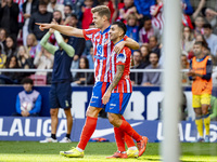 Alexander Sorloth of Atletico de Madrid (L) celebrates his goal with Angel Correa of Atletico de Madrid (R) during the La Liga EA Sports 202...