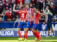 Alexander Sorloth of Atletico de Madrid celebrates his goal with Angel Correa and Conor Gallagher of Atletico de Madrid during the La Liga E...