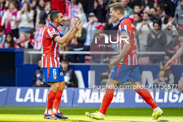 Alexander Sorloth of Atletico de Madrid (R) celebrates his goal with Angel Correa of Atletico de Madrid (L) during the La Liga EA Sports 202...