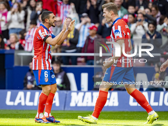 Alexander Sorloth of Atletico de Madrid (R) celebrates his goal with Angel Correa of Atletico de Madrid (L) during the La Liga EA Sports 202...