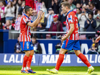 Alexander Sorloth of Atletico de Madrid (R) celebrates his goal with Angel Correa of Atletico de Madrid (L) during the La Liga EA Sports 202...