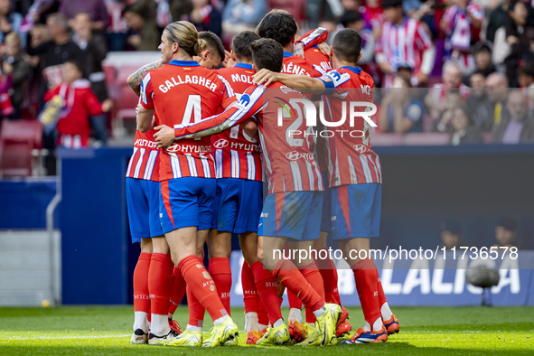 Players of Atletico de Madrid (from left to right) Conor Gallagher, Giuliano Simeone, and Jorge Resurreccion Merodio (Koke) celebrate a goal...