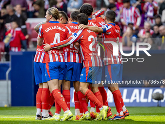 Players of Atletico de Madrid (from left to right) Conor Gallagher, Giuliano Simeone, and Jorge Resurreccion Merodio (Koke) celebrate a goal...