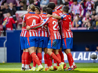 Players of Atletico de Madrid (from left to right) Conor Gallagher, Giuliano Simeone, and Jorge Resurreccion Merodio (Koke) celebrate a goal...