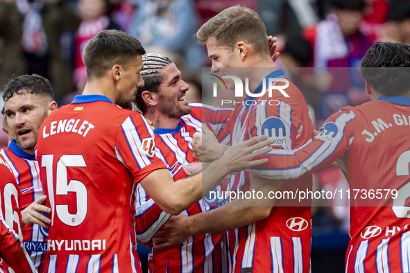 Players of Atletico de Madrid (from L to R) Clement Lenglet, Rodrigo De Paul, and Alexander Sorloth celebrate a goal during the La Liga EA S...