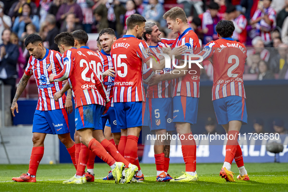 Players of Atletico de Madrid (from left to right) Angel Correa, Giuliano Simeone, Javi Galan, Clement Lenglet, Rodrigo De Paul, Alexander S...