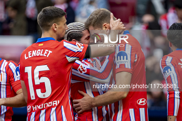 Players of Atletico de Madrid (from L to R) Clement Lenglet, Rodrigo De Paul, and Alexander Sorloth celebrate a goal during the La Liga EA S...